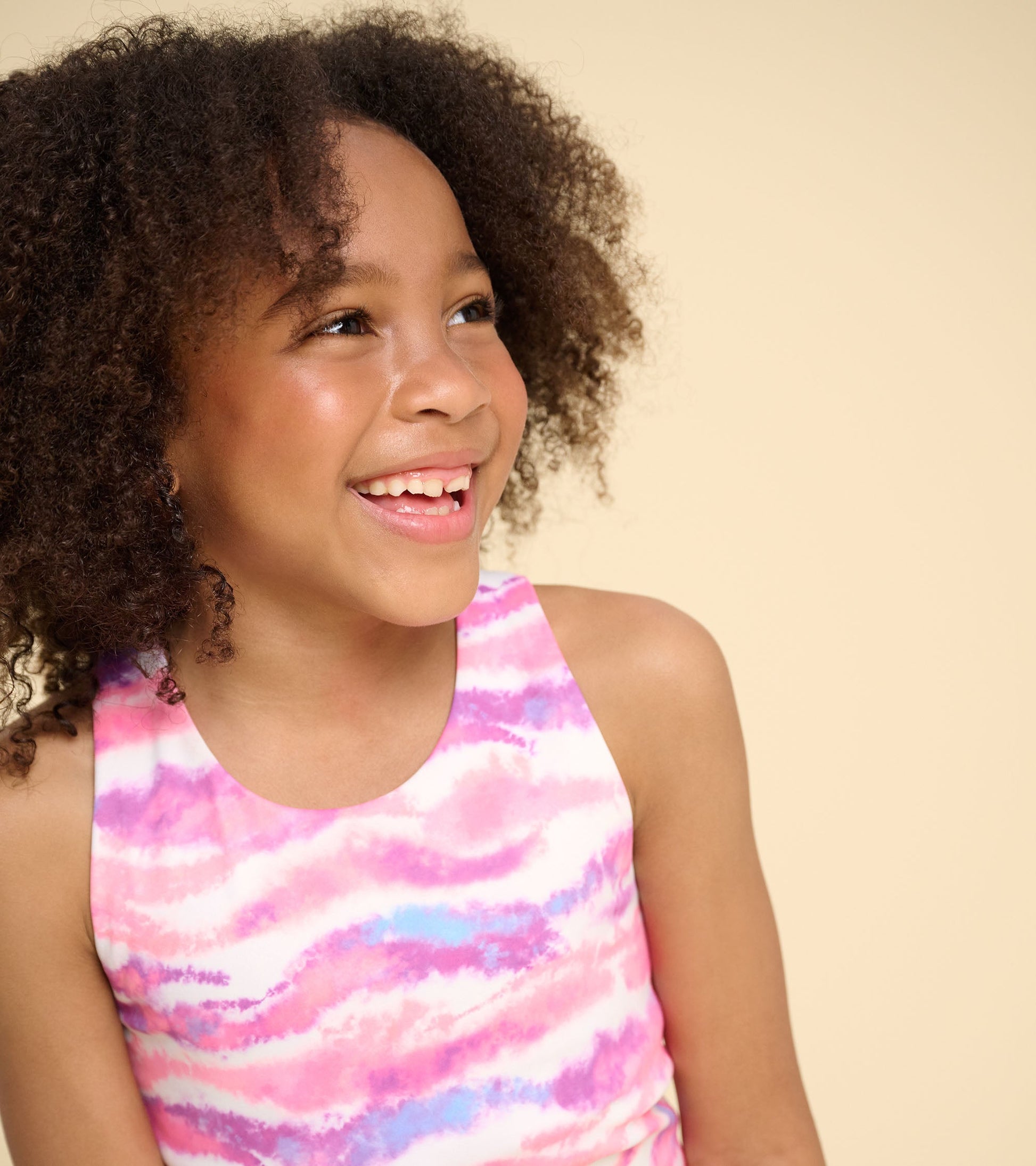 Girls' tank top featuring a candy ombre pattern in pink, purple, and blue, perfect for casual summer wear.