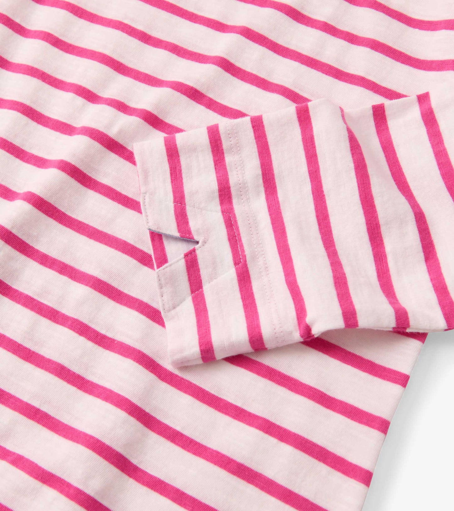 Fuchsia and white striped long-sleeve top with a folded sleeve detail.