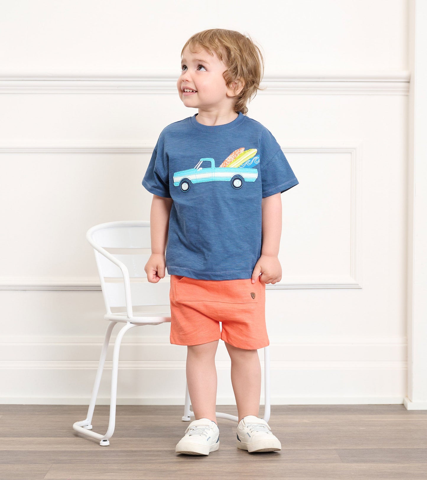Coral kangaroo shorts for baby and toddler girls, featuring a comfortable fit and soft fabric.