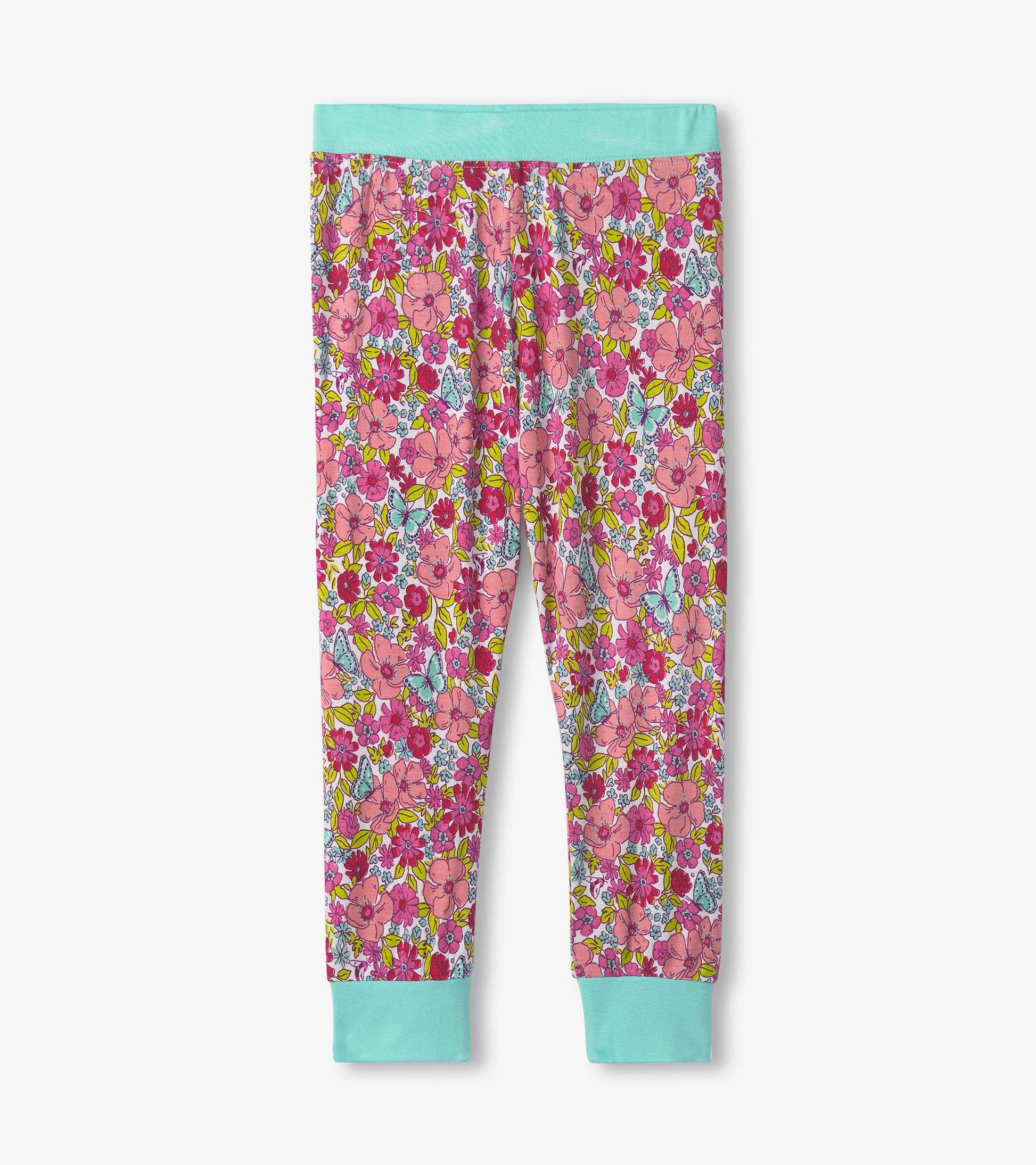 Pink floral pajama pants with turquoise cuffs and waistband, made from soft bamboo fabric.
