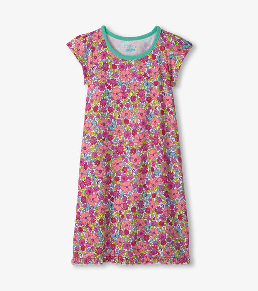 Pink nightdress featuring a vibrant floral pattern with short sleeves and a turquoise neckline.