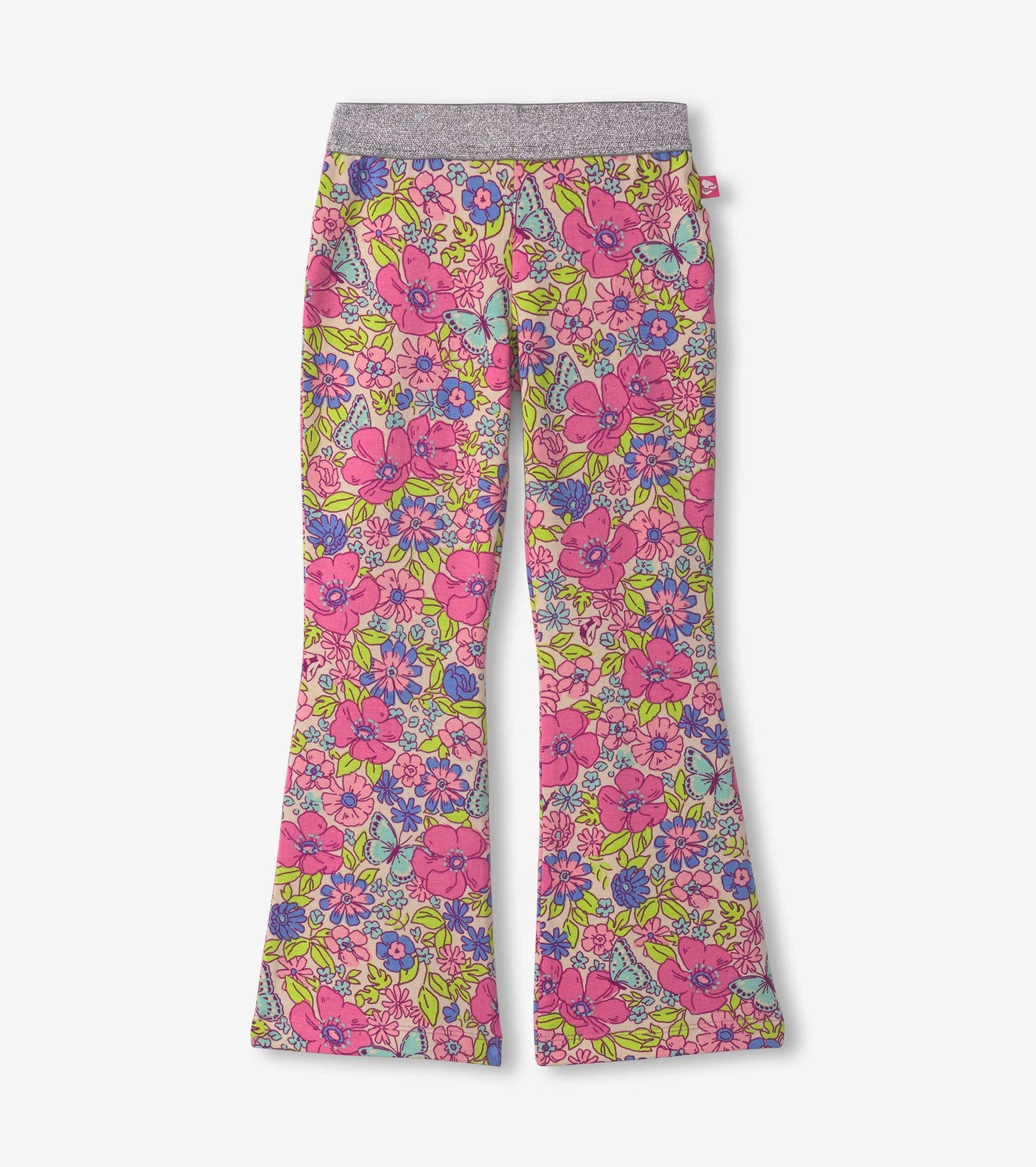 Pink bell bottom pants featuring a vibrant floral pattern with purple and green accents. Stretchy waistband for comfort.