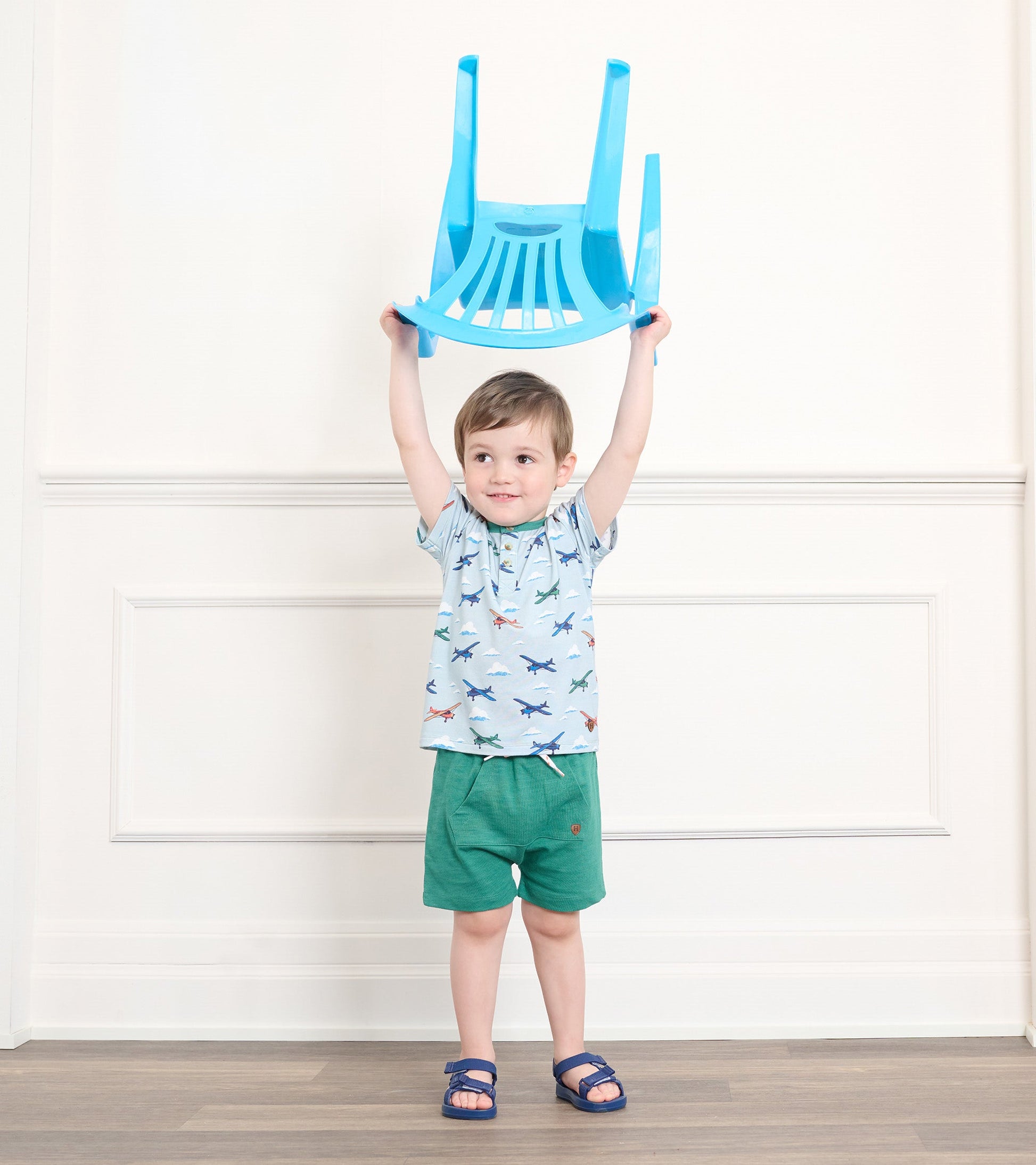 Emerald green kangaroo shorts for baby and toddler boys, featuring a comfortable fit and casual style.