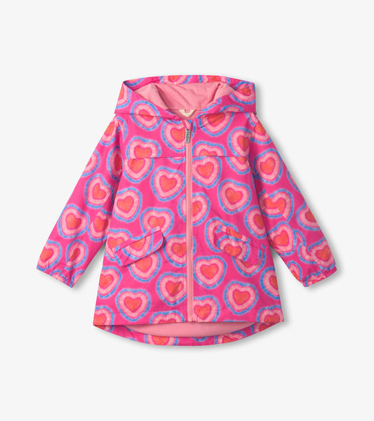 Lightweight pink rain jacket with a heart pattern, zip-up front, and hood, featuring two front pockets.