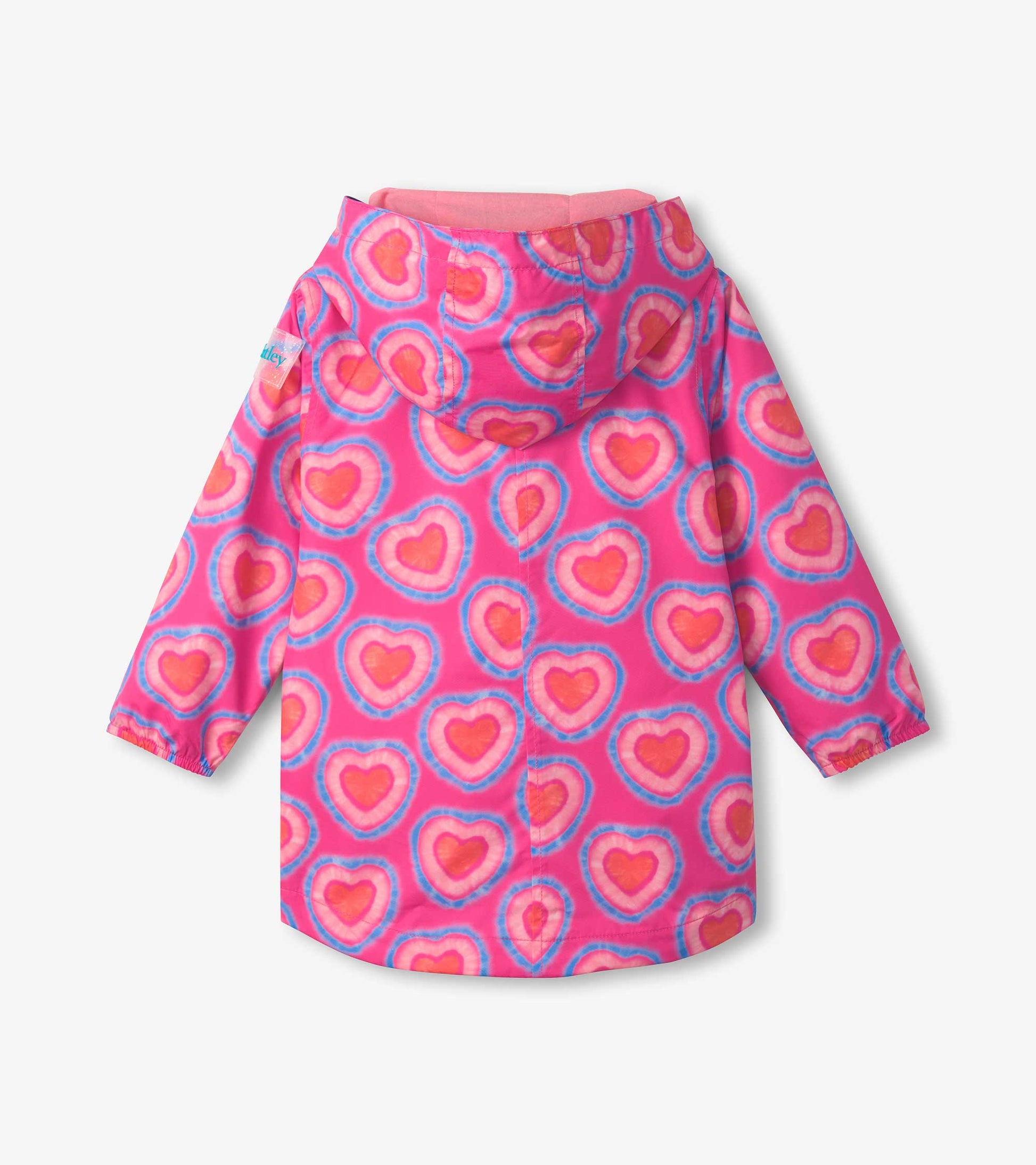 Lightweight pink rain jacket with a colorful heart pattern and a hood, featuring elastic cuffs and a rounded hem.