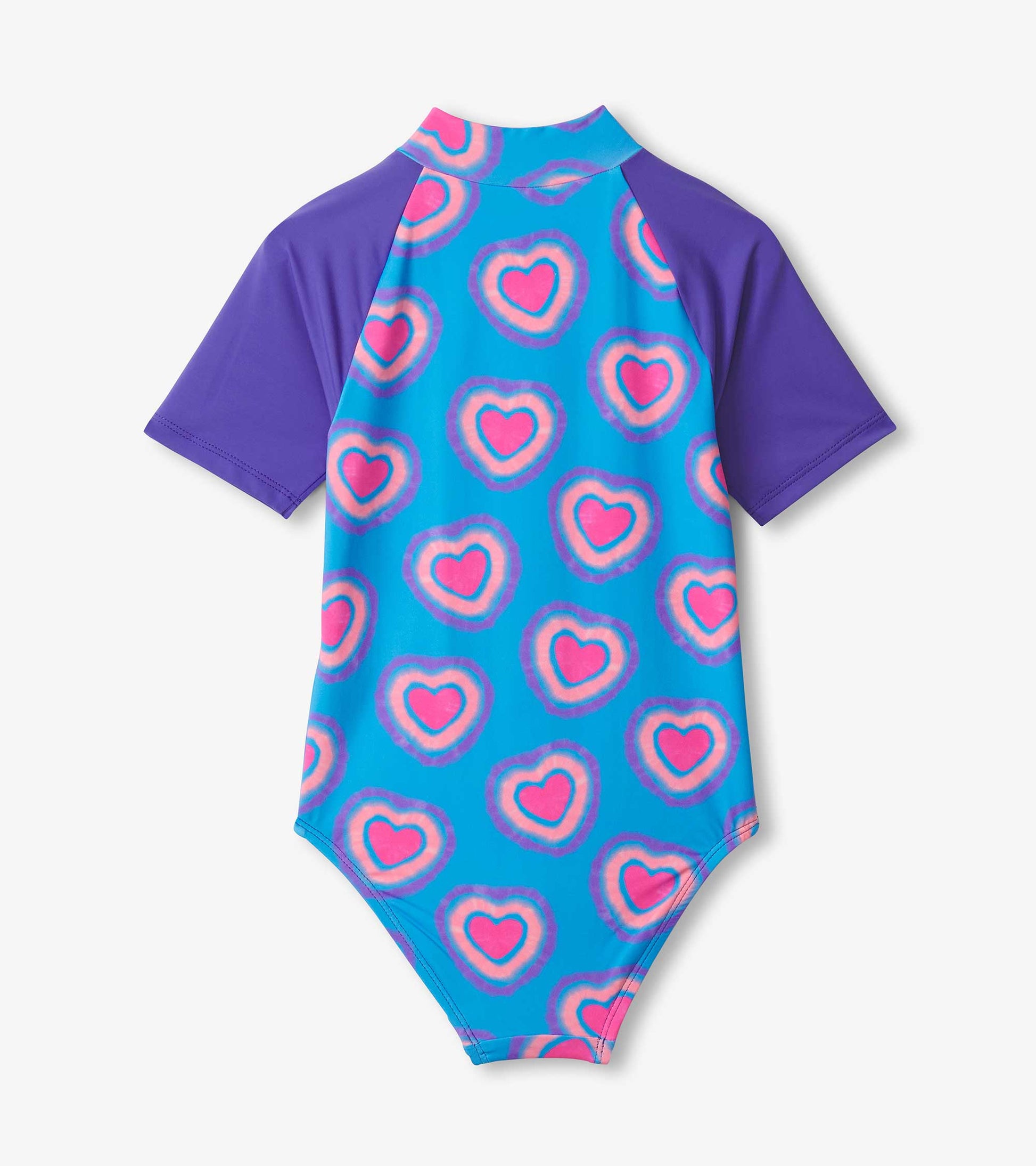 One-piece rashguard in blue with purple sleeves, featuring a pattern of colorful hearts. Ideal for swimwear.