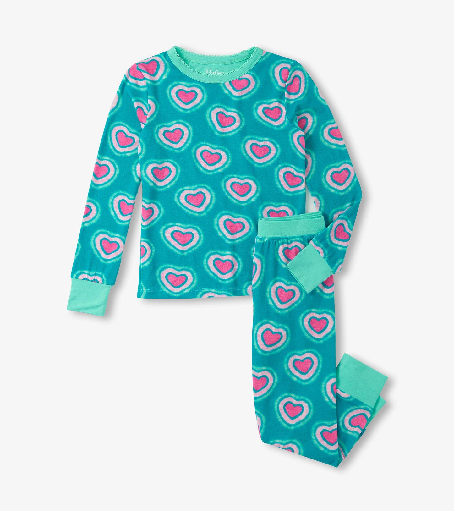 Turquoise bamboo pajama set featuring a playful heart pattern in pink and white, includes long-sleeve top and pants.