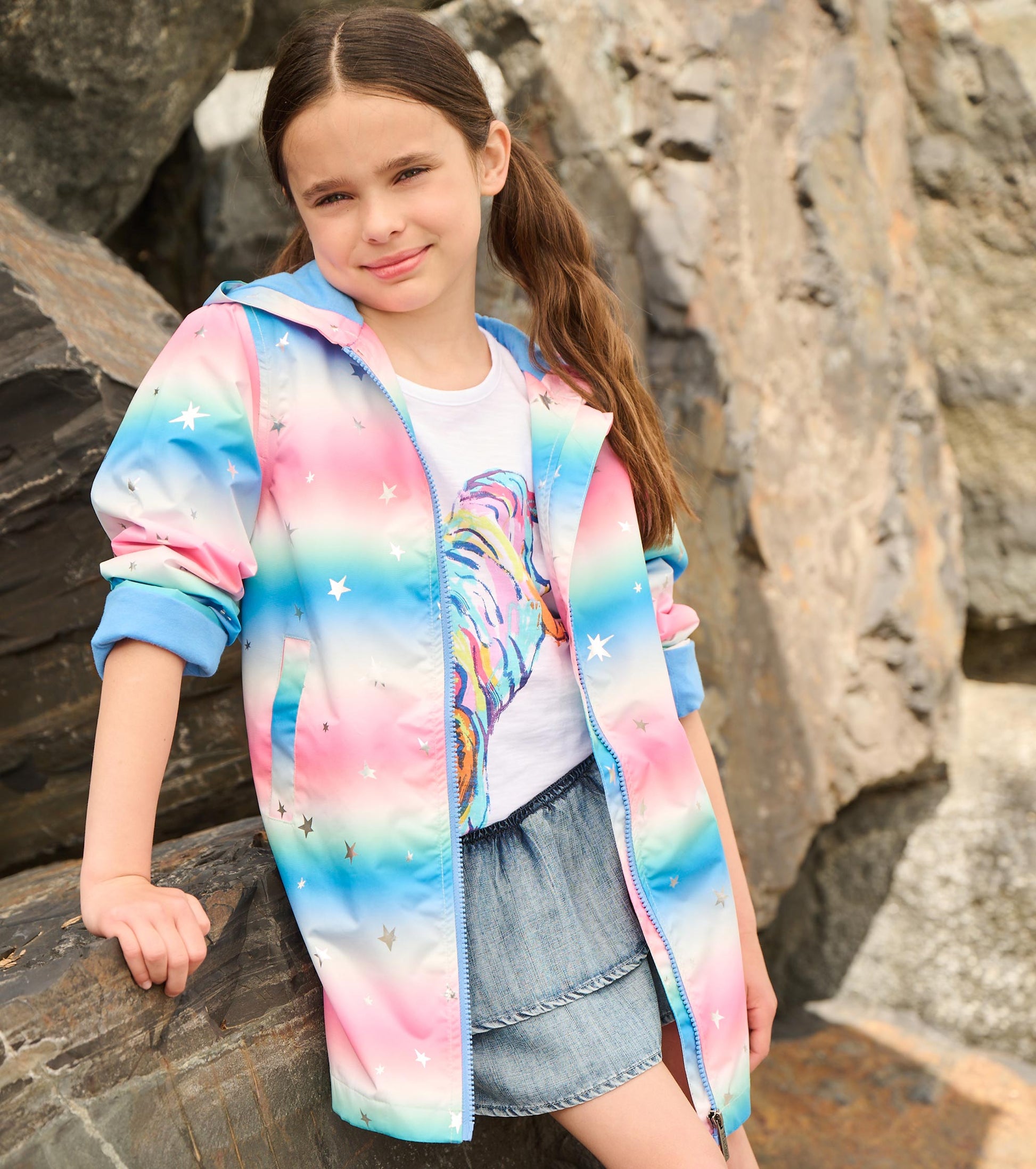 Pastel A-line swing jacket with glitter stars, featuring a hood and zip closure, perfect for casual wear.