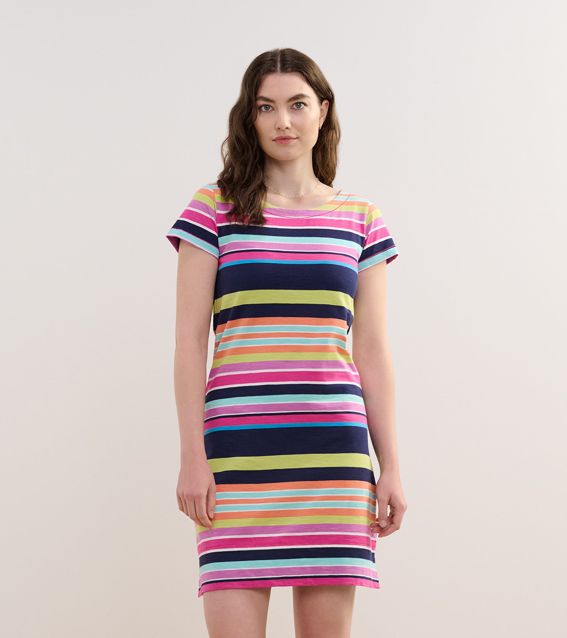 Short-sleeve dress featuring vibrant horizontal stripes in pink, blue, green, and purple, with a relaxed fit.