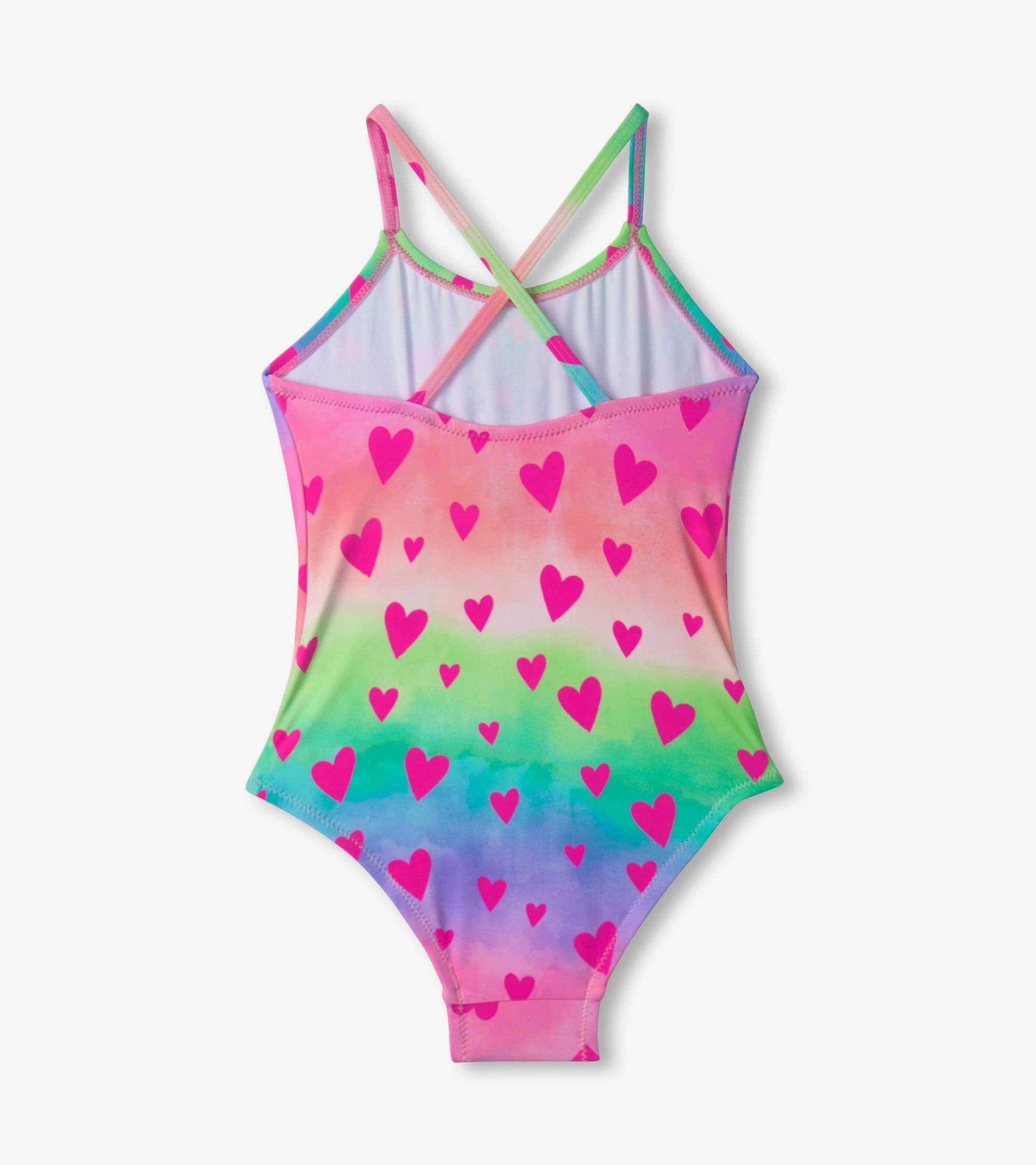 Multicolored swimsuit featuring a ruched front and a heart pattern, with crisscross straps at the back.