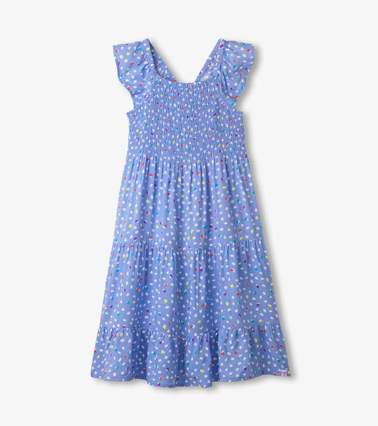 Light blue smocked dress with colorful polka dots and ruffled sleeves, featuring a tiered skirt design.