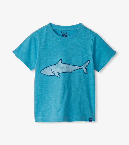 Light blue short-sleeve tee featuring a shark graphic on the front, made from soft, breathable fabric.