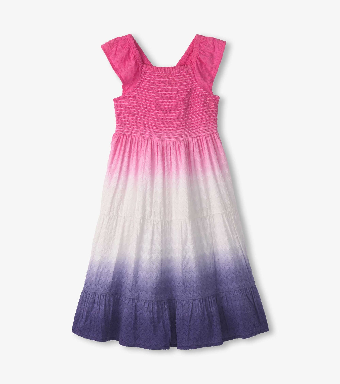 Purple dip dye smocked dress featuring pink straps, a tiered skirt, and a textured pattern. Ideal for casual wear.