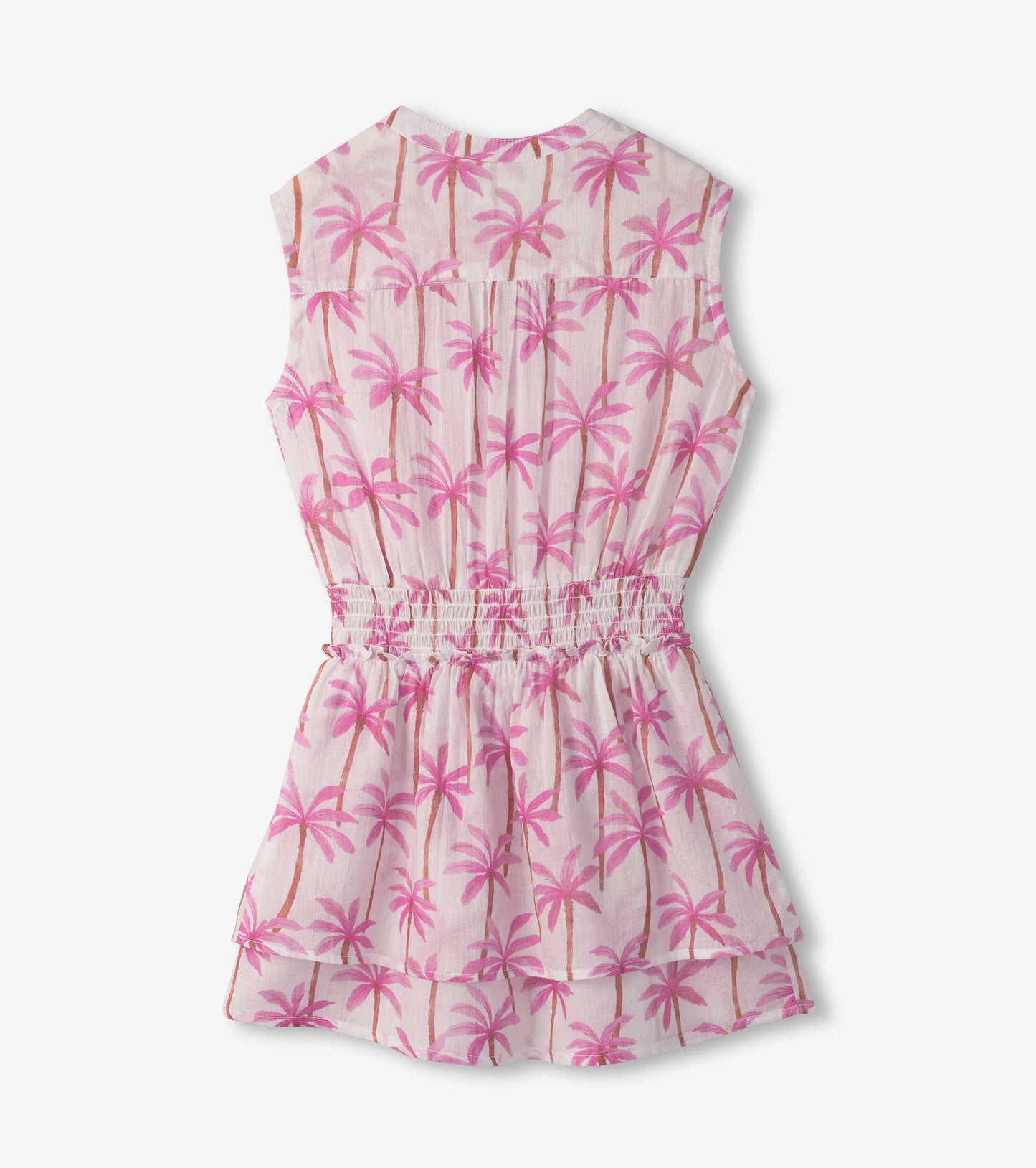 Pink sleeveless dress with a smocked waist and palm tree pattern, featuring a tiered skirt design.