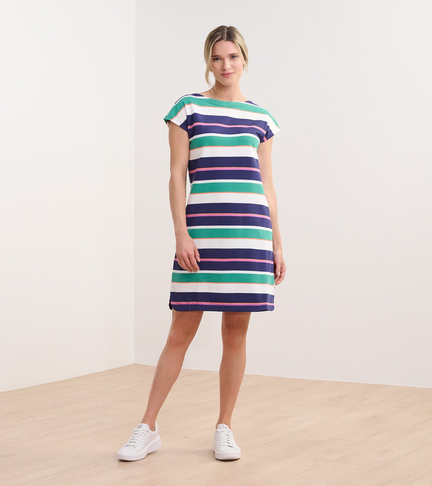 Short-sleeve dress featuring horizontal stripes in green, navy, and white, with a relaxed fit and knee-length hem.