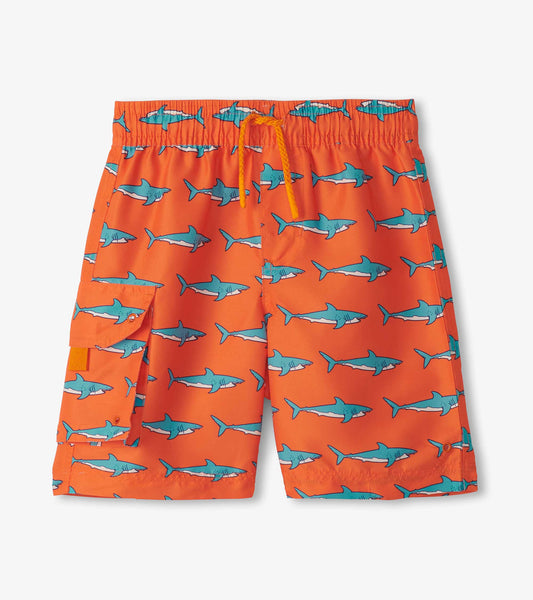 Orange board shorts featuring a shark pattern, elastic waistband with drawstring, and side pocket.