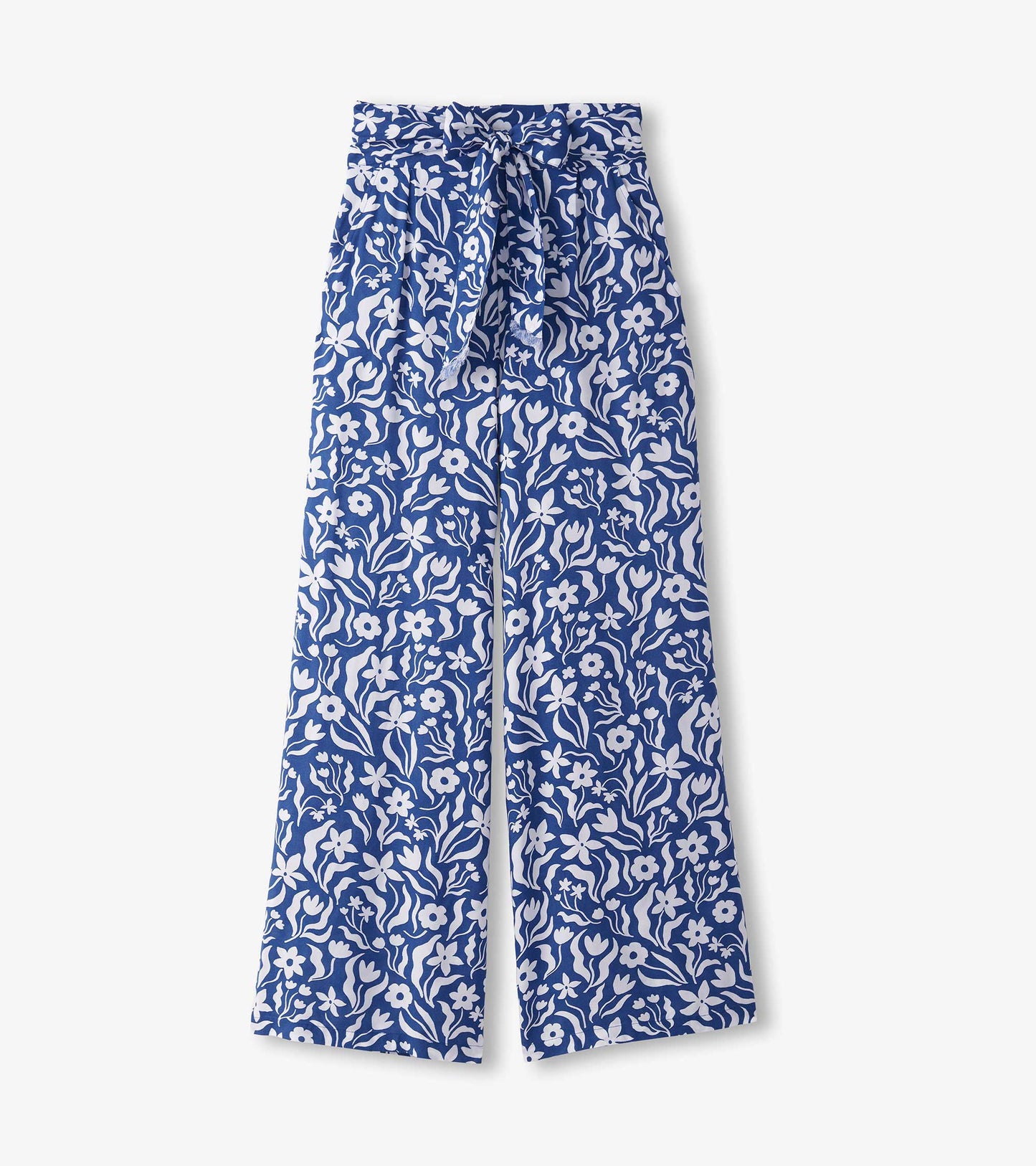 Blue wide leg pants featuring a white wavy floral pattern and a tied waistband.