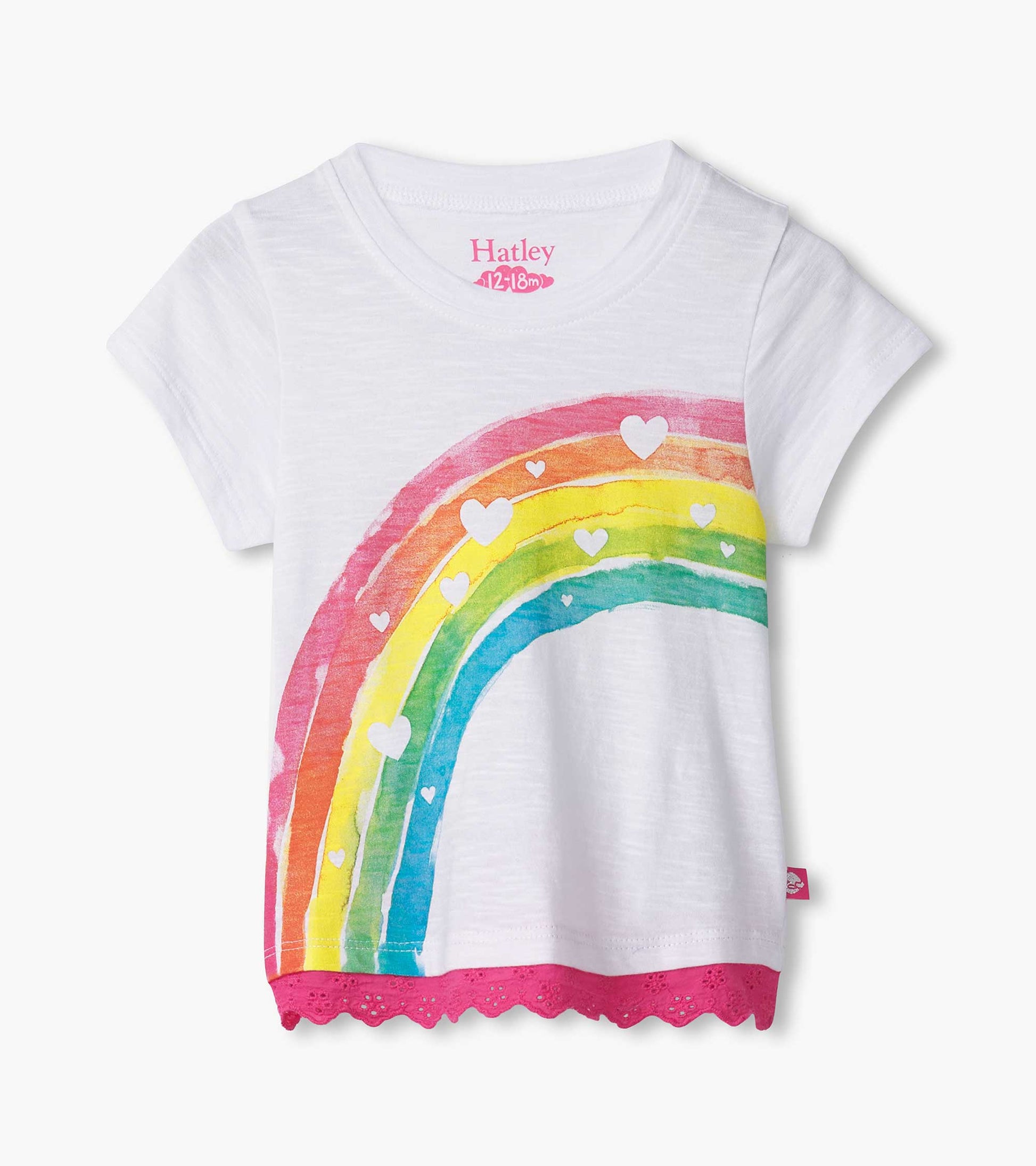 White t-shirt featuring a colorful rainbow and heart design, with eyelet trim at the hem. Suitable for baby and toddler girl…