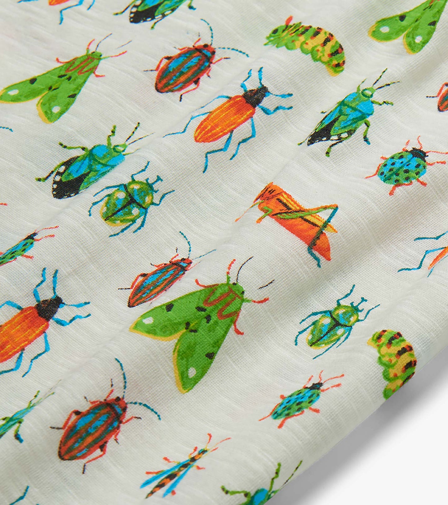 White T-shirt fabric with colorful insect print, including beetles, moths, and grasshoppers, close-up view