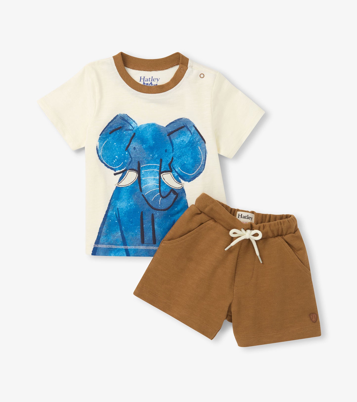 Cream elephant graphic T-shirt with brown trim and shoulder snaps paired with brown drawstring shorts