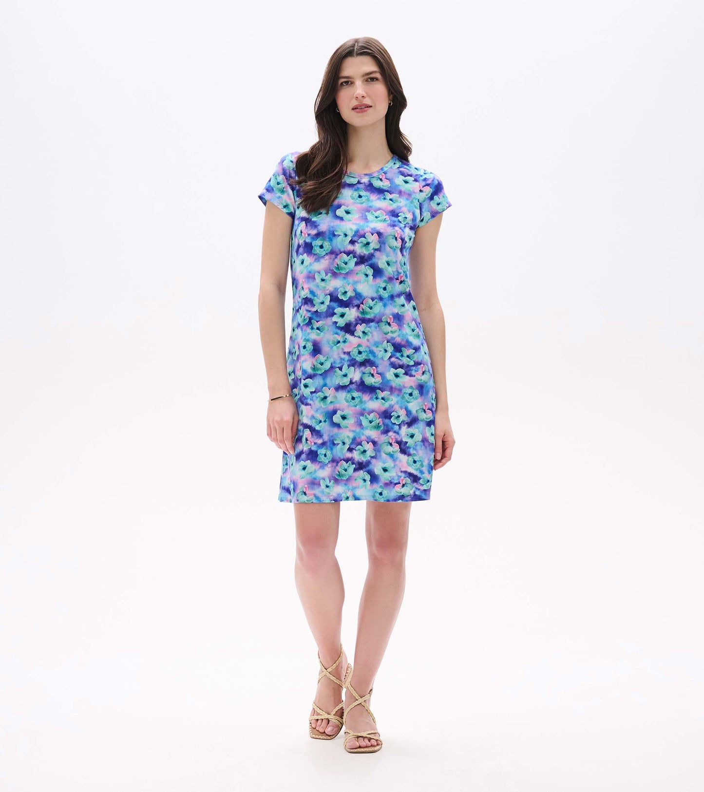 Front angled view of knee-length A-line dress with short sleeves and watercolor floral print