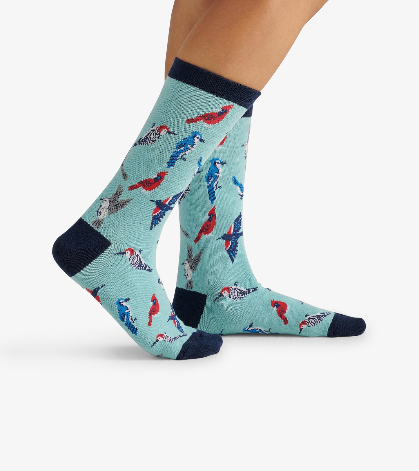 Light blue crew socks featuring colorful bird patterns and navy accents, suitable for casual wear.