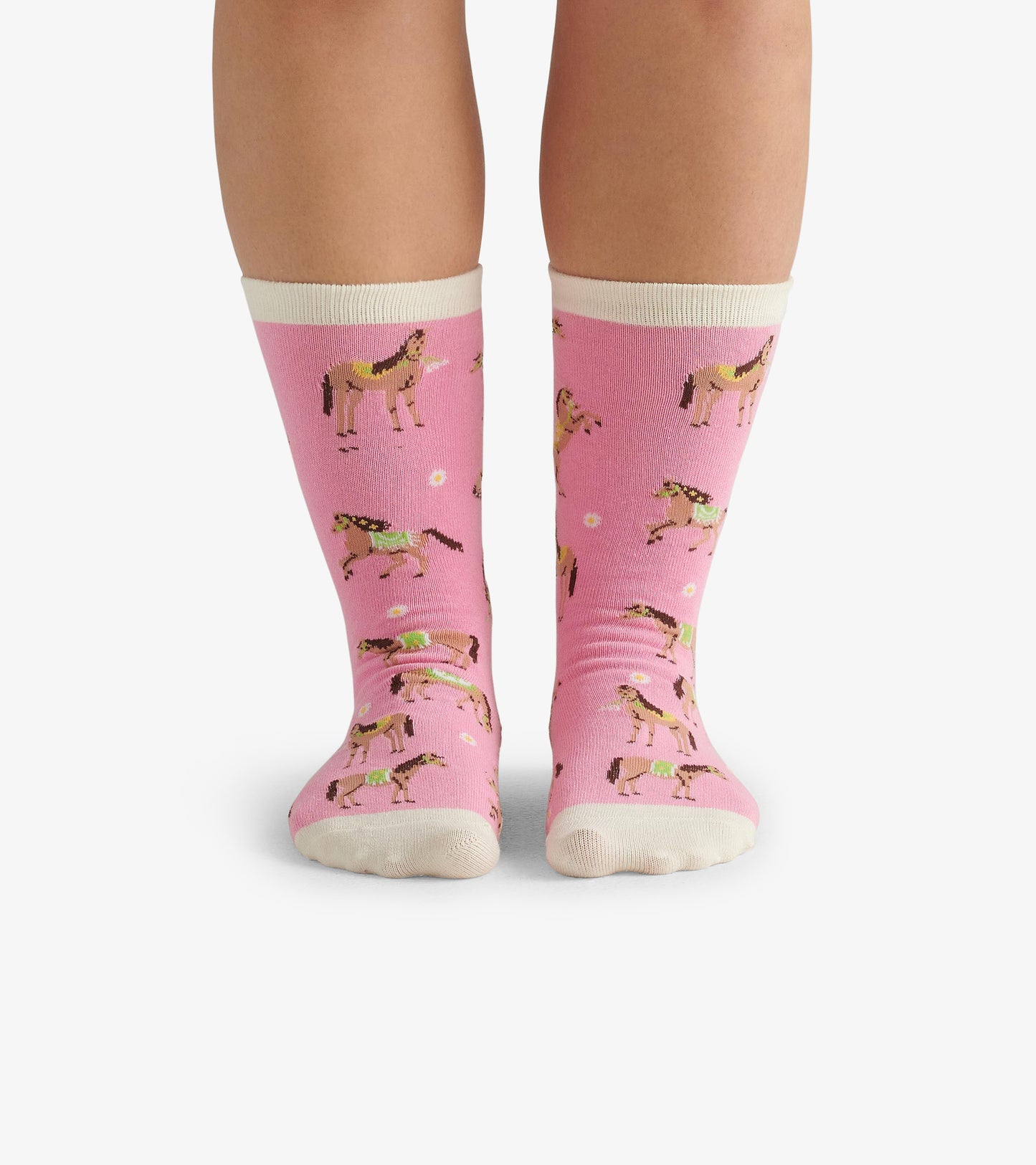 Pink crew socks featuring playful horse patterns and a contrasting white cuff. Suitable for casual wear.