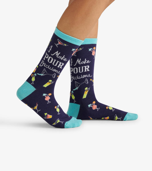 Navy crew socks featuring colorful cocktail illustrations and the text "I Make POUR Decisions," with turquoise accents.