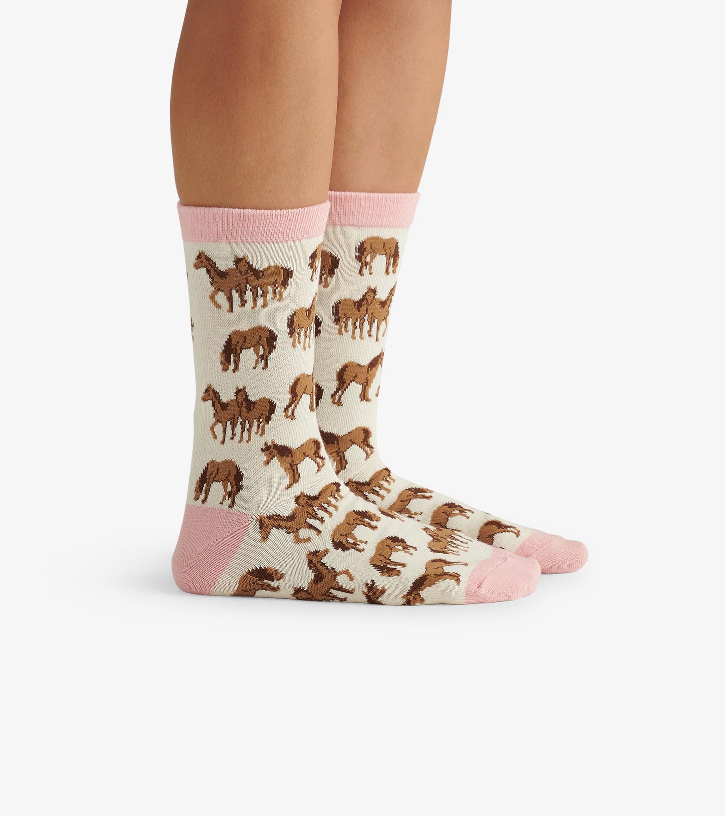 Cream socks with a horse pattern, featuring pink cuffs and toes, suitable for casual wear.