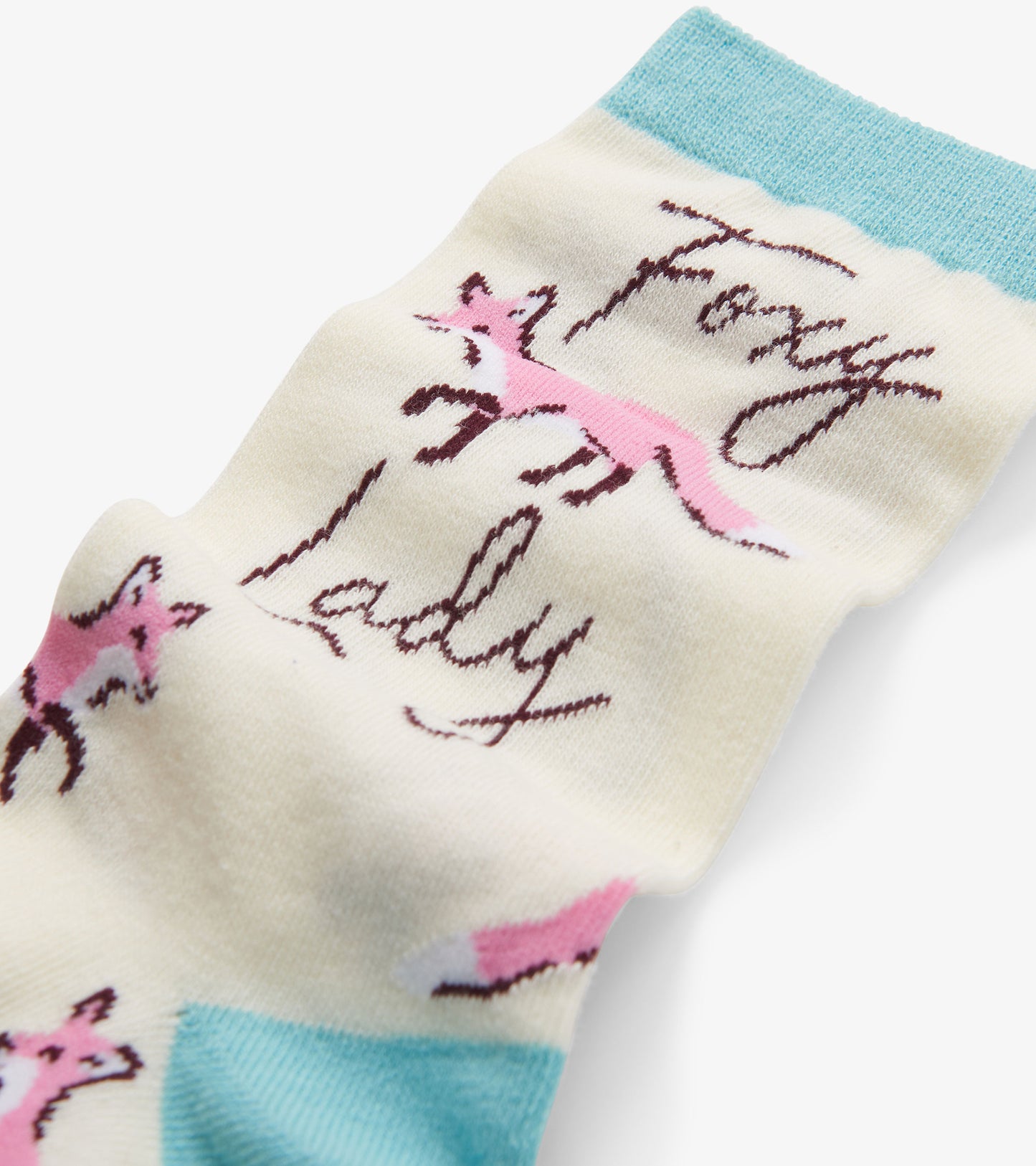 Cream crew socks featuring playful pink fox designs and "Foxy Lady" text, with a light blue cuff.