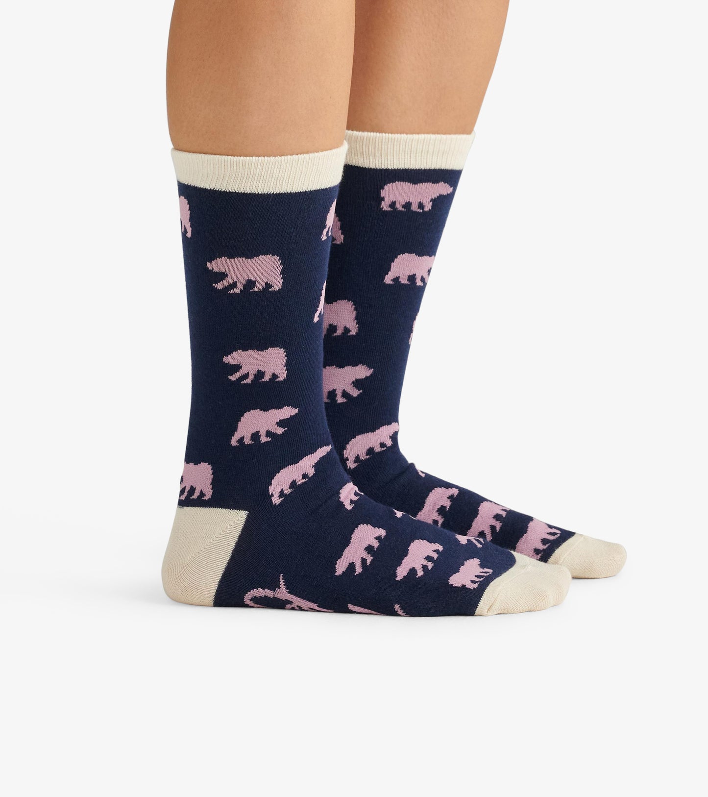 Navy crew socks featuring pink bear patterns and a cream cuff, designed for casual wear.