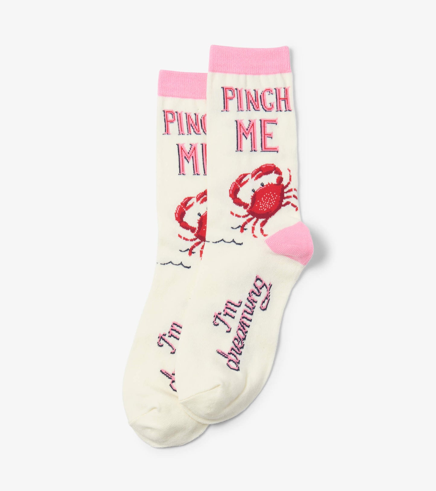 Cream crew socks with pink cuffs, featuring a red crab design and text "PINCH ME" and "I'm dreaming.