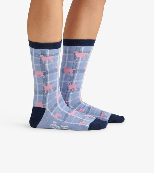 Light blue crew socks with a pink dog pattern and navy accents, suitable for casual wear.