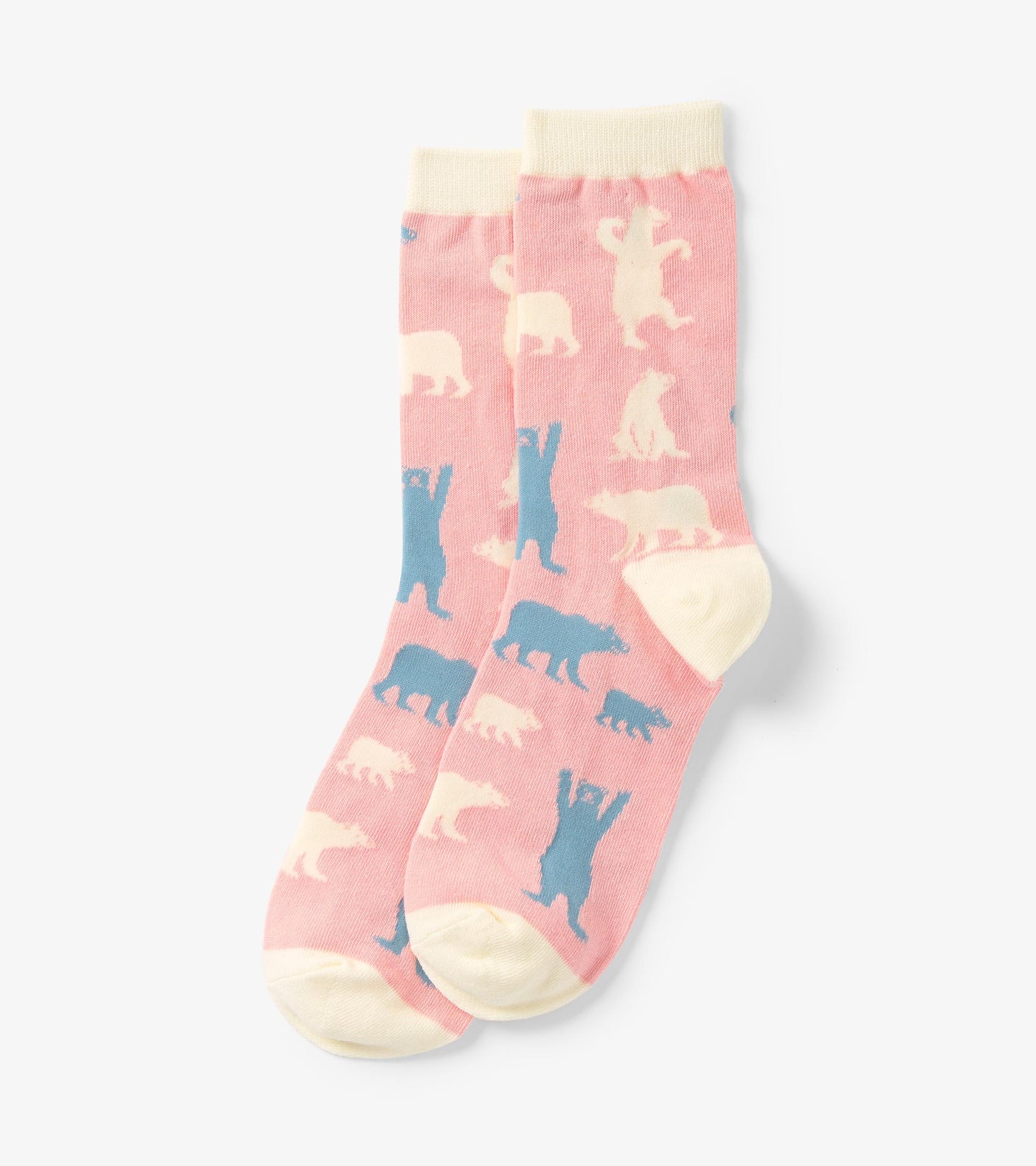 Pink crew socks featuring playful polar bear patterns in blue and cream, with a contrasting cream cuff and toe.