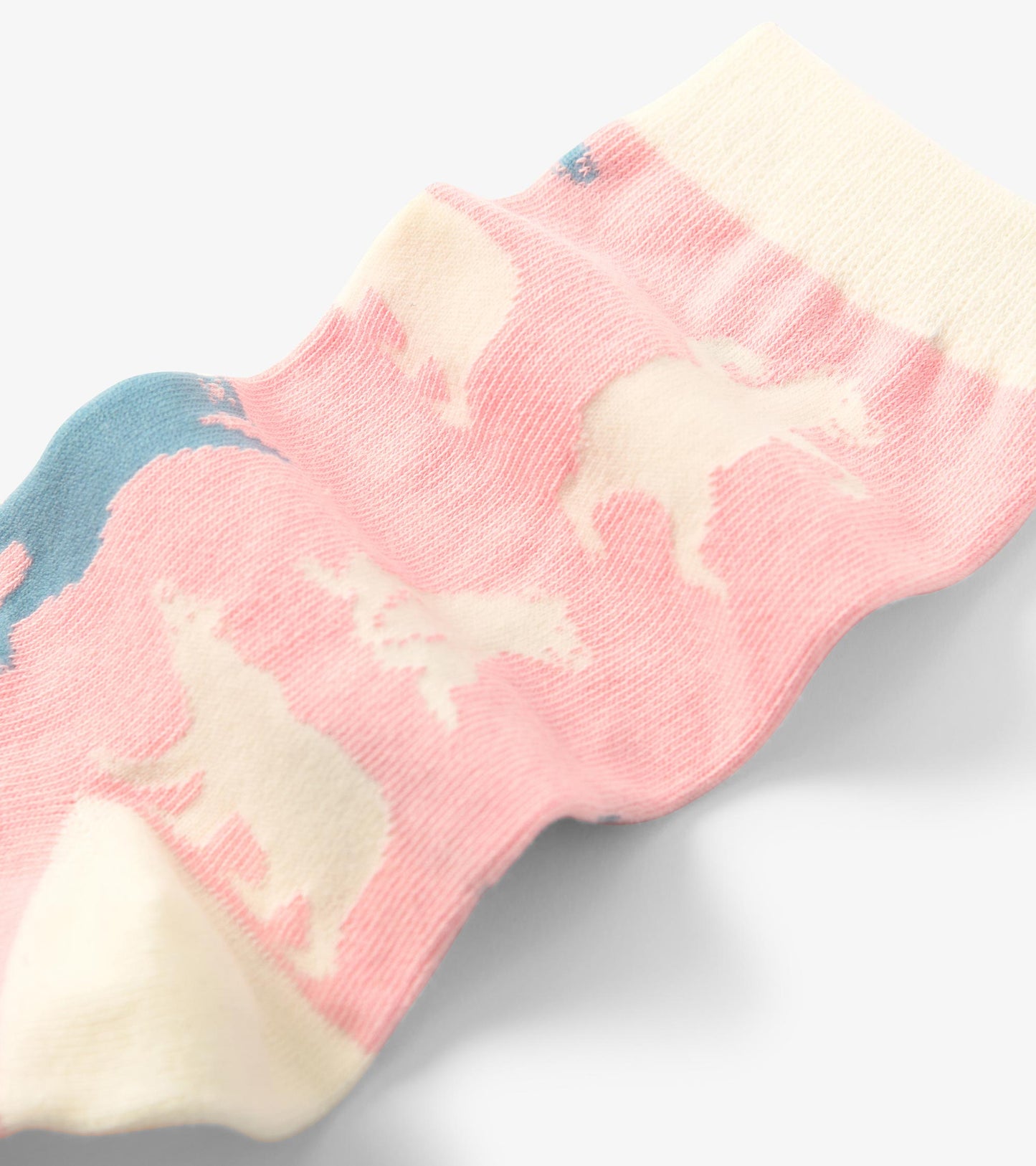 Pink crew socks featuring polar bear patterns in white and blue, made from soft material. One size fits all.