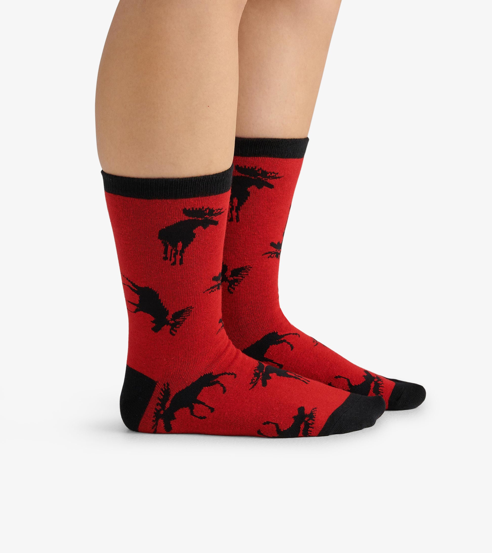Red crew socks featuring black moose silhouettes, designed for casual wear.