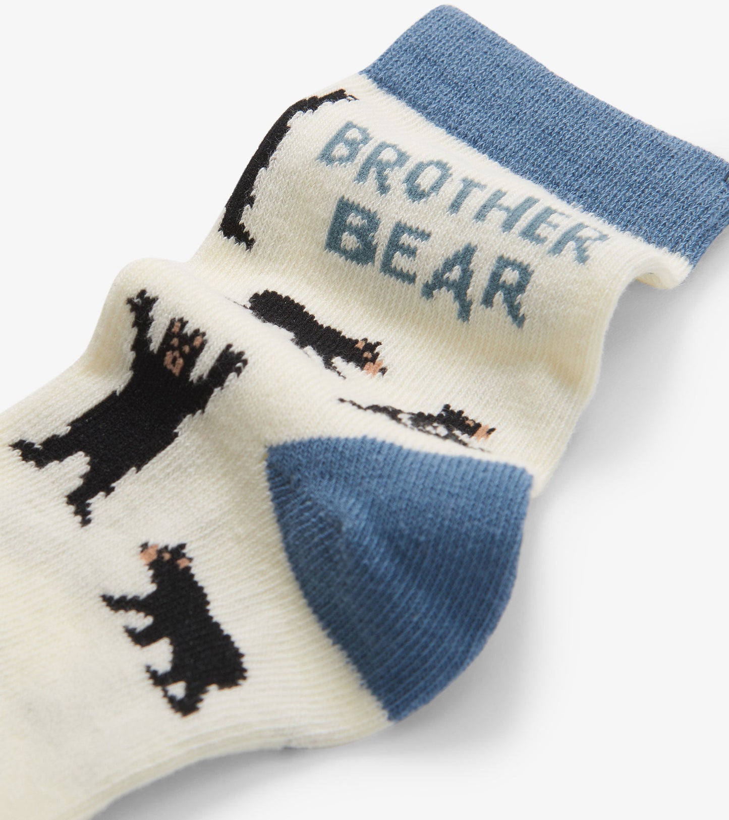 Cream crew socks featuring black bear patterns and a blue cuff, suitable for ages 2-4 or 4-7.