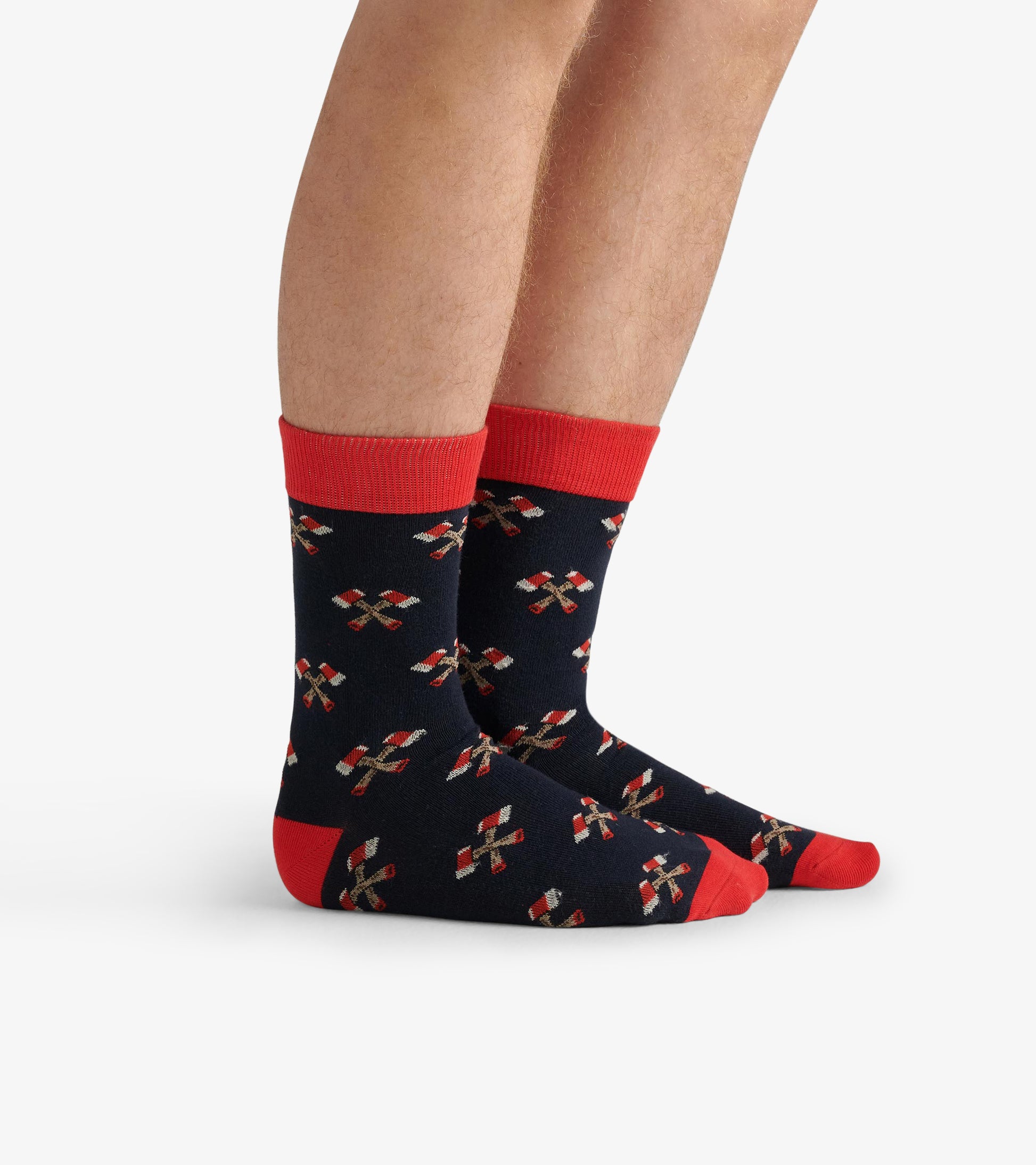 Navy crew socks with red accents and a playful pattern of candy canes, suitable for casual wear.