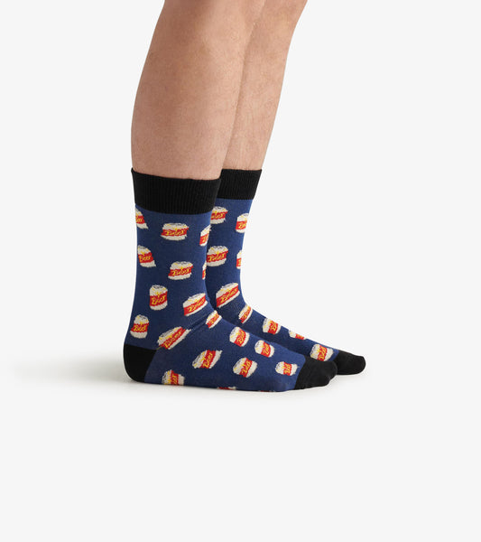 Navy crew socks featuring a playful beer can pattern, with black cuffs and toe. One size fits most.