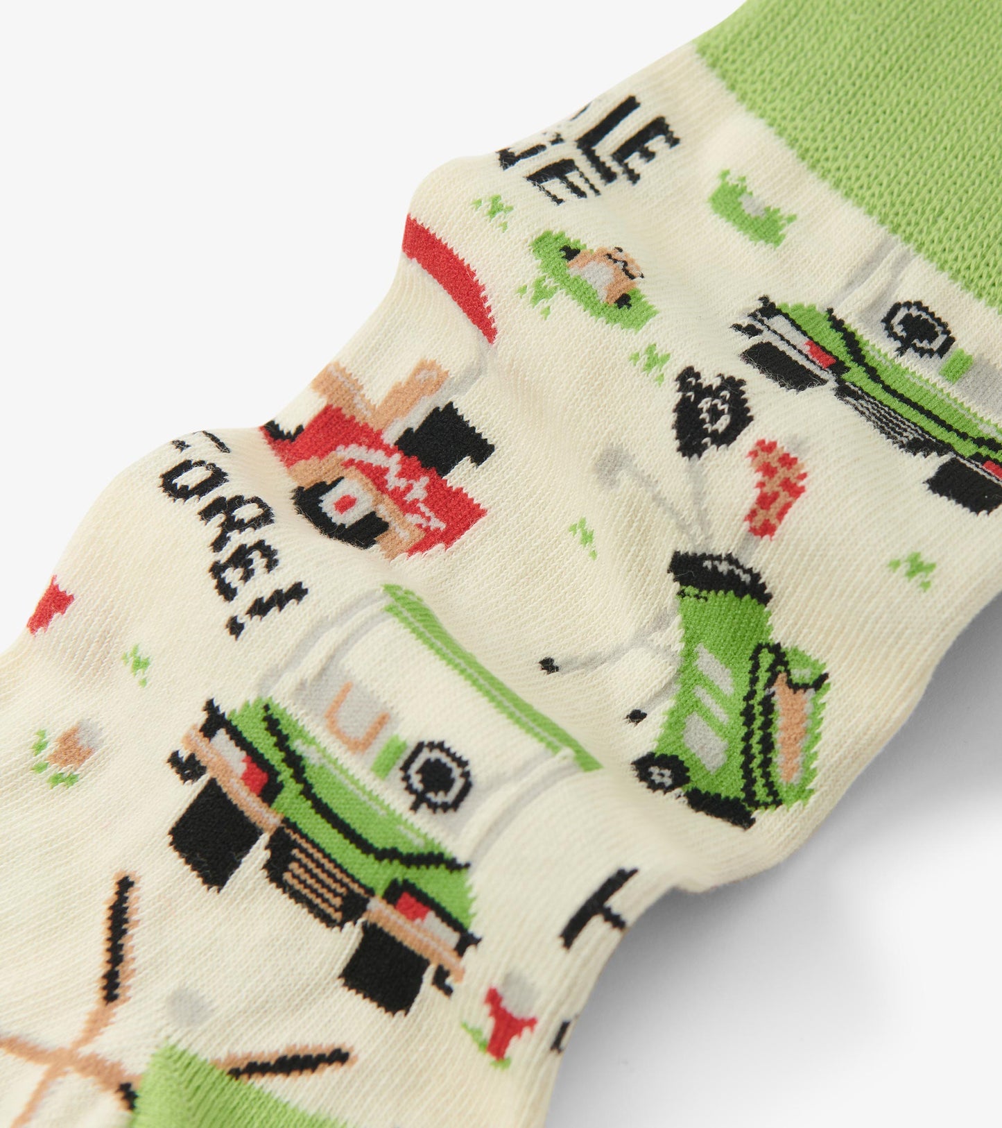Cream crew socks featuring playful green and red lawn care graphics. One size fits all.