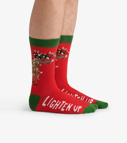 Red crew socks featuring a moose design with green accents and "LIGHTEN UP" text on the side. One size fits all.