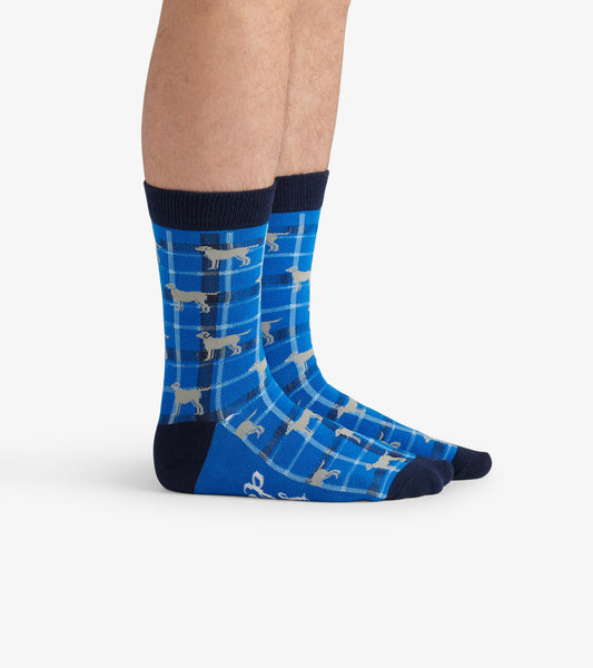Blue crew socks featuring a plaid pattern with playful dog silhouettes, designed for casual wear.