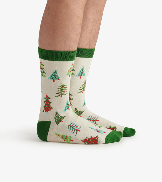Cream socks featuring colorful Christmas tree patterns and green accents, suitable for festive occasions.