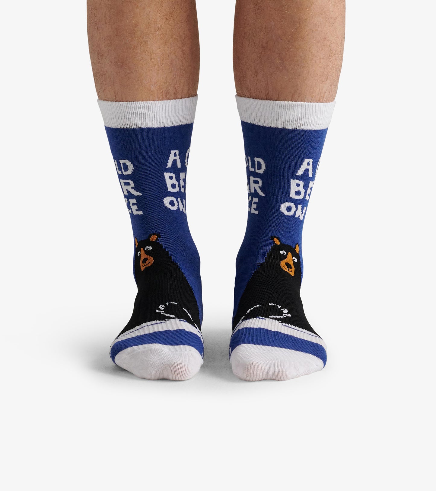 Blue crew socks featuring a bear graphic and text, with white and black accents. One size fits most.