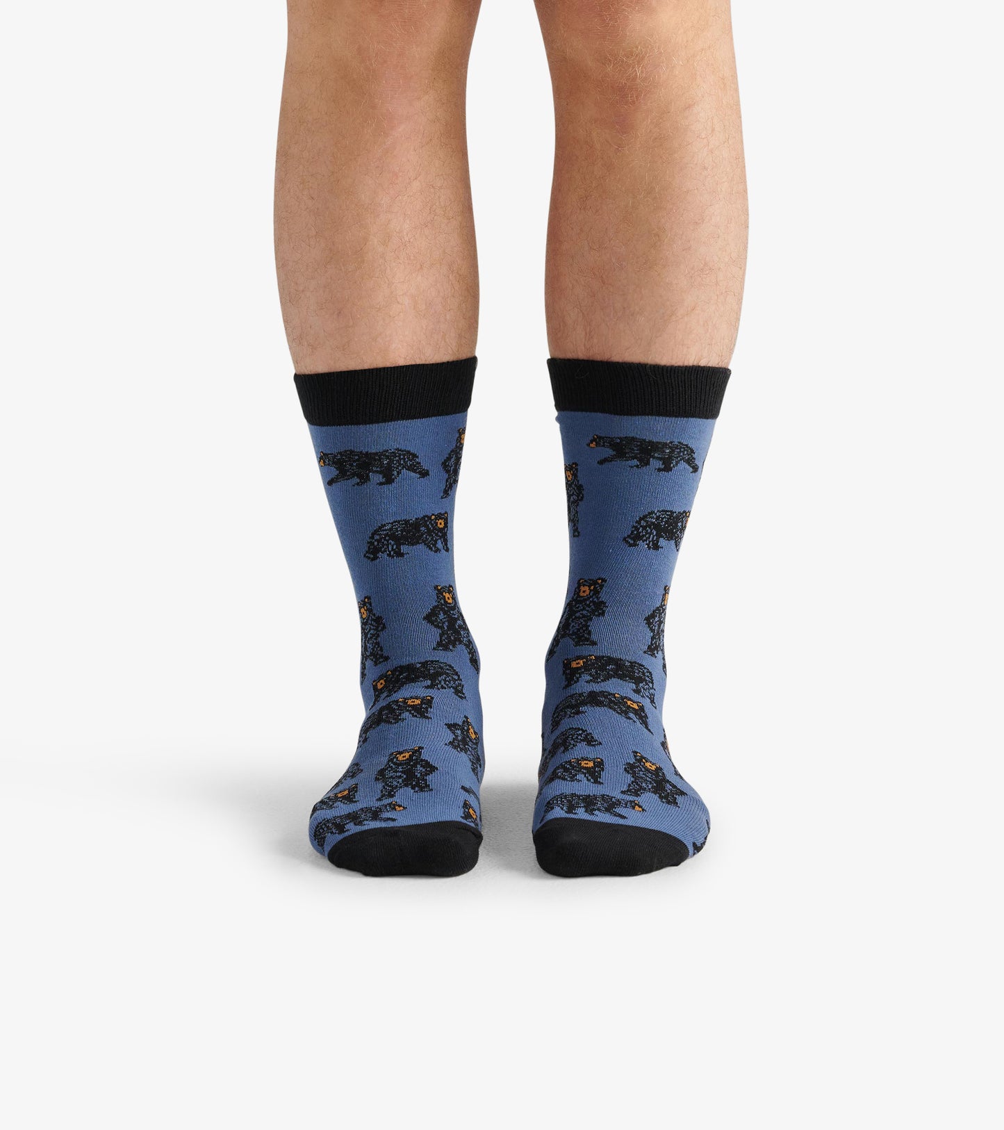 Blue crew socks featuring a bear pattern with black accents, suitable for casual wear.