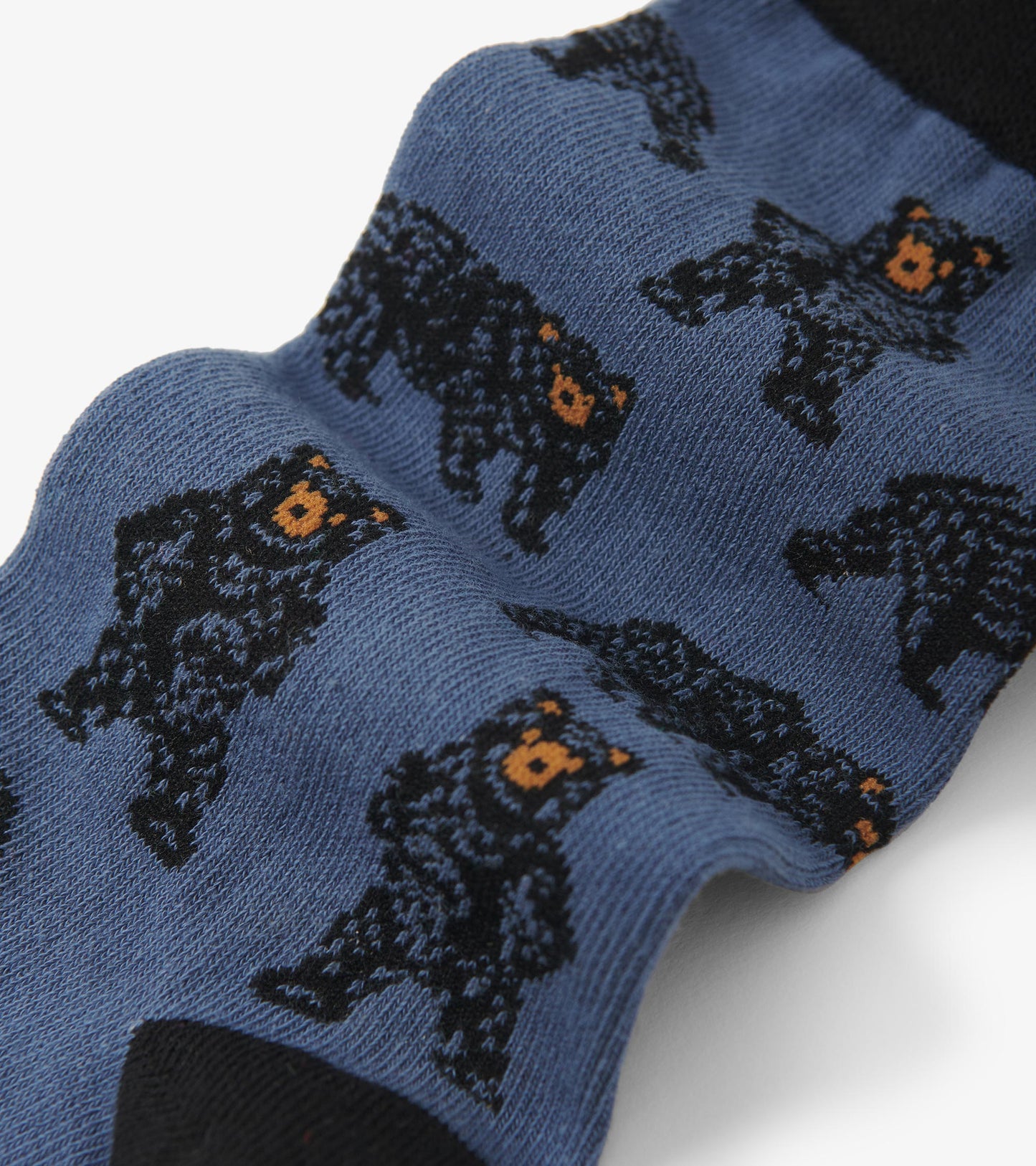 Blue crew socks featuring a playful bear pattern in black and orange, made from soft, comfortable material.