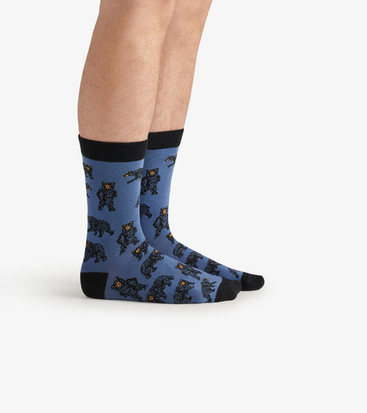 Blue crew socks featuring a playful bear pattern, with black accents at the cuff and toe. One size fits most.