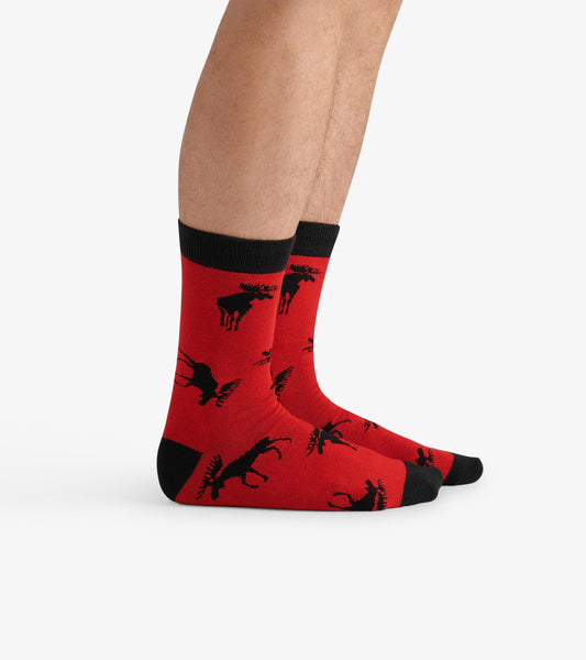 Red crew socks featuring a black moose pattern and black cuffs, designed for casual wear.
