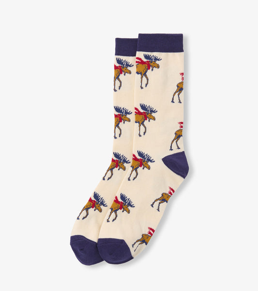 Cream-colored crew socks featuring a moose pattern, with navy blue cuffs and toes. One size fits most.