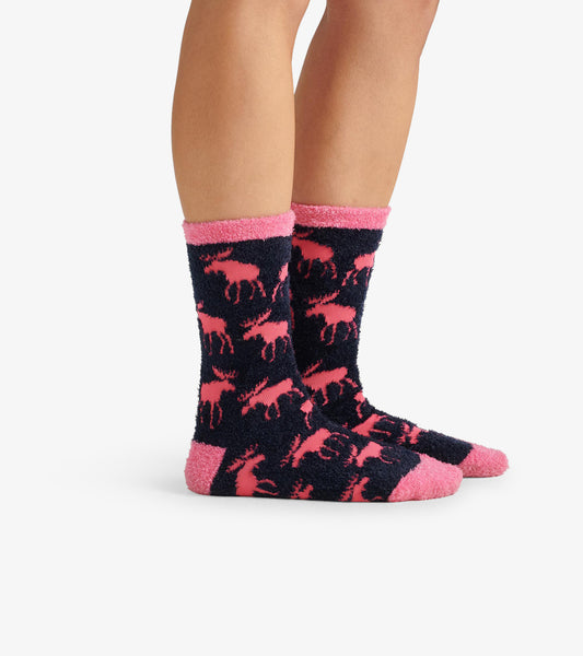 Navy fuzzy socks with pink moose pattern and contrasting pink cuffs, designed for warmth and comfort.